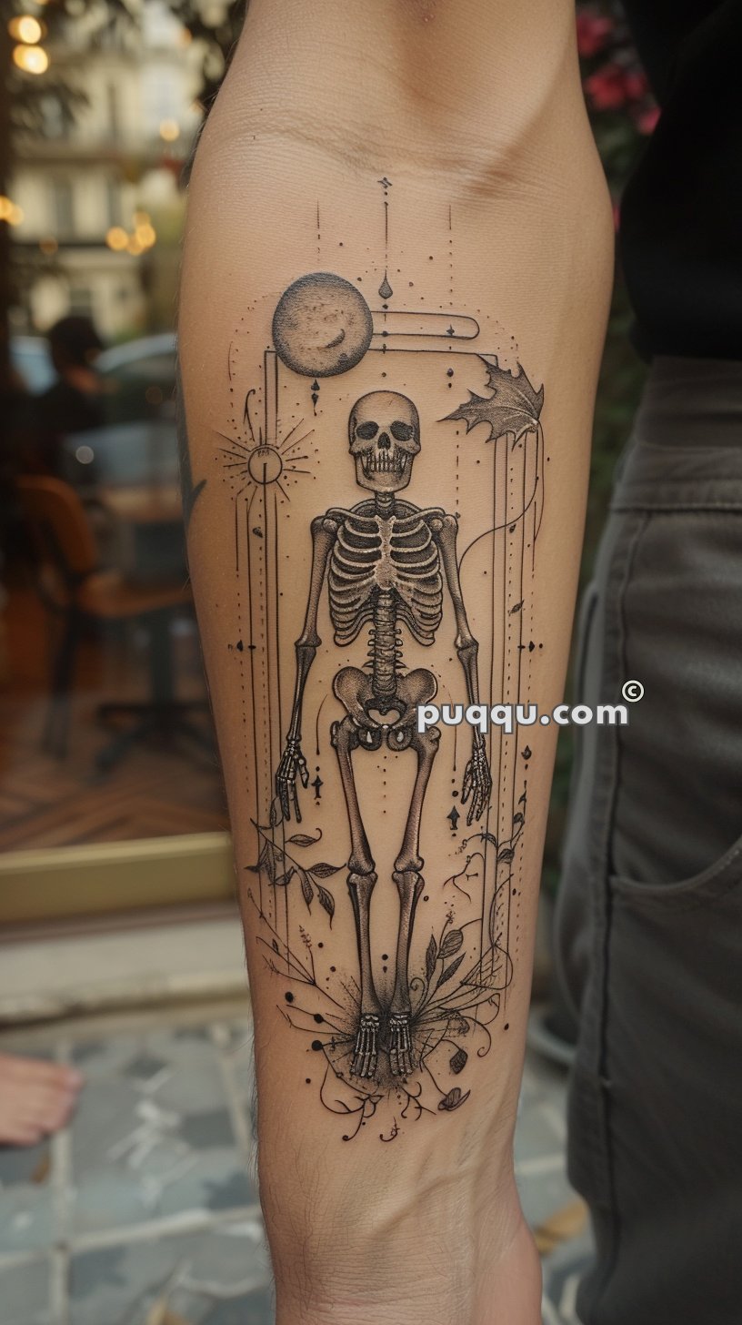 Detailed skeleton tattoo with celestial elements, including the moon, stars, and abstract designs, on a person's forearm.