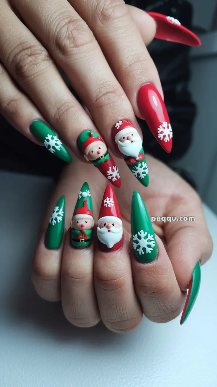 Festive Christmas-themed nail art featuring red and green designs with 3D snowflakes, Santa Claus, and elf faces.