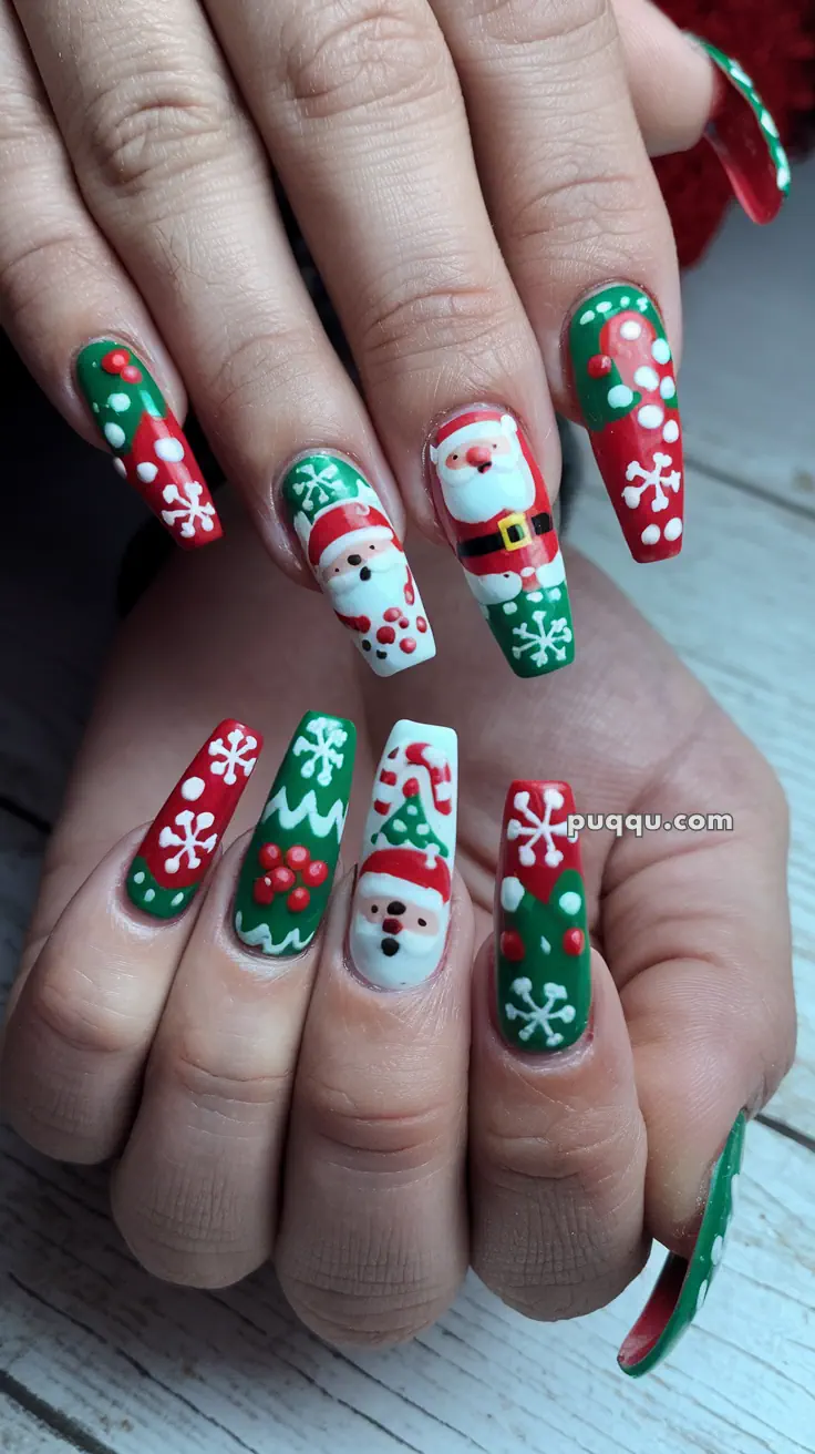 Fingernails with festive Christmas designs featuring Santa Claus, snowflakes, and holly in red, green, and white colors.