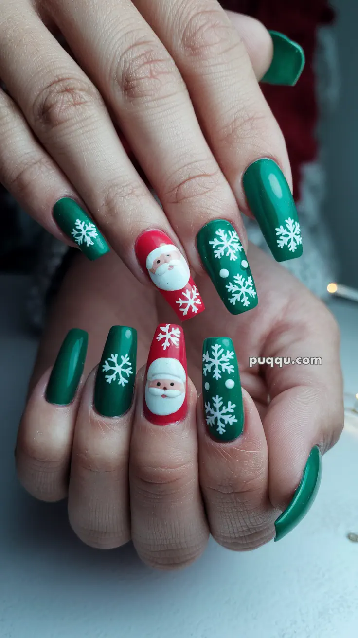 Green and red Christmas-themed nail art with snowflake and Santa Claus designs.